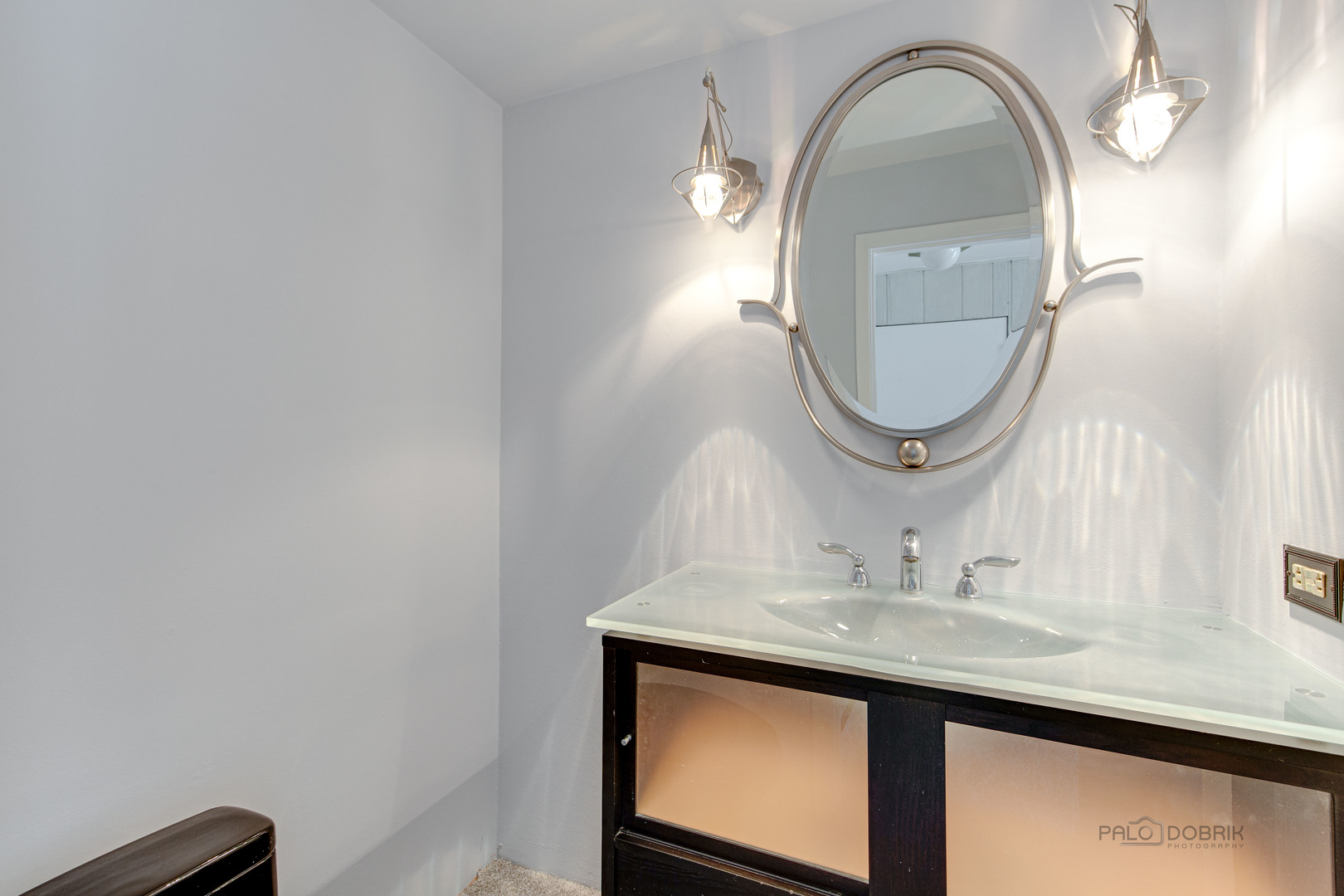 9747 Huber Ovl Niles, IL 60714 - Photo 7 of 38 a bathroom with a sink and a mirror