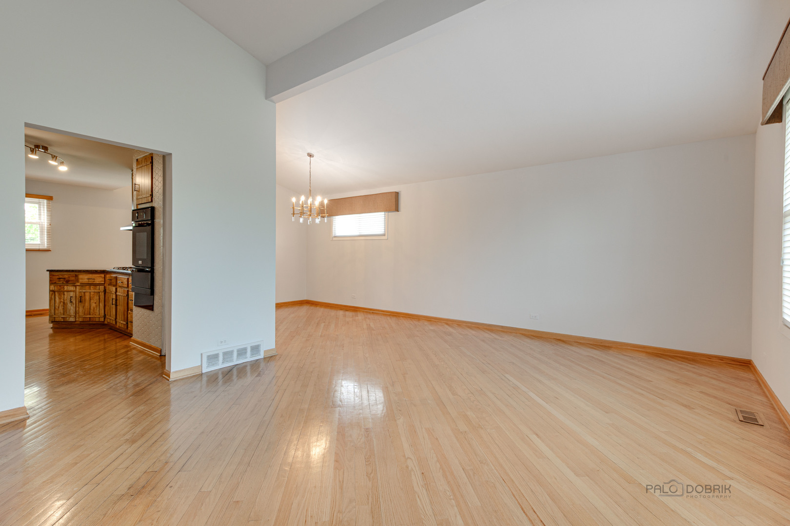 9747 Huber Ovl Niles, IL 60714 - Photo 8 of 38 a view of a room with wooden floor