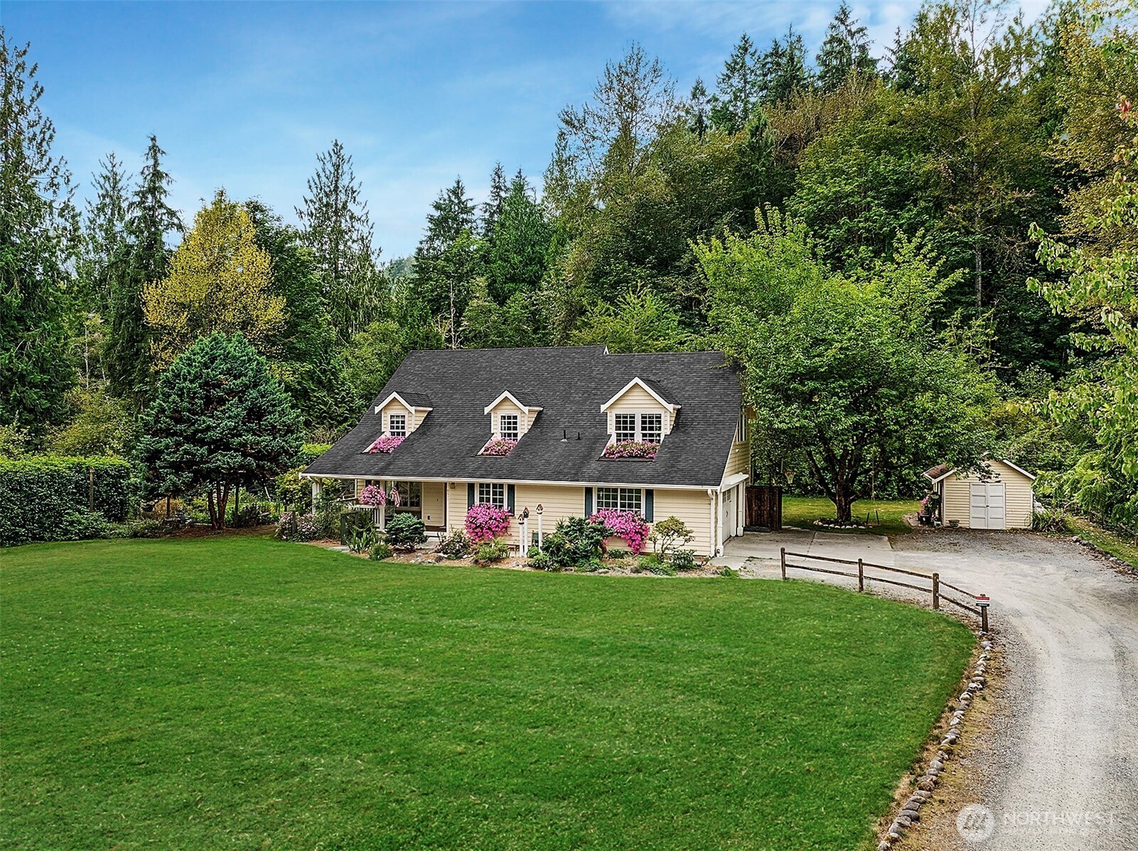 6511 Tolt River Road Northeast Carnation, WA 98014 - Photo 1 of 37 a view of a house with a big yard