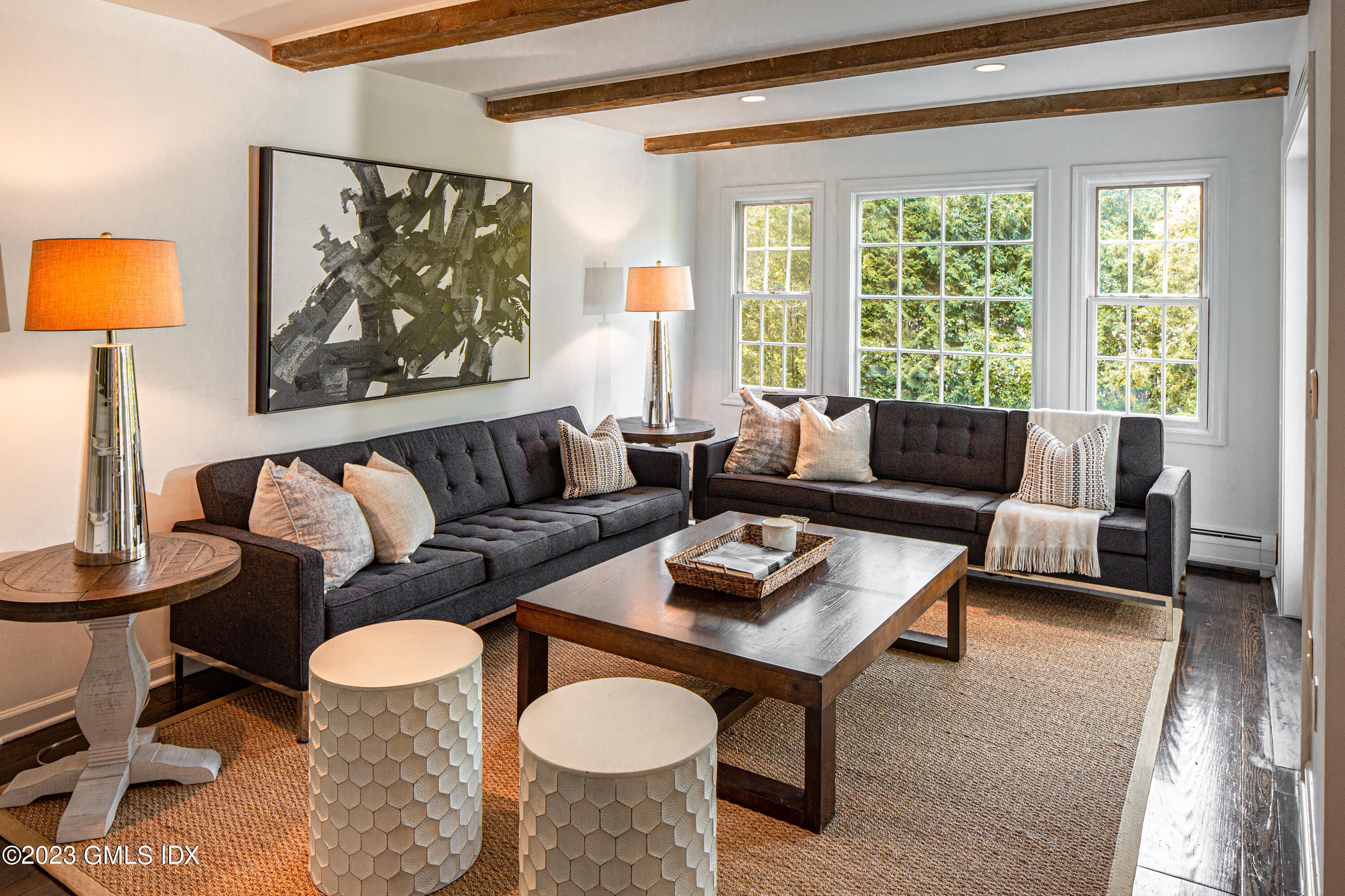 86 North Old Stone Bridge Road Cos Cob, CT 06807 - Photo 8 of 27 a living room with furniture and a large window