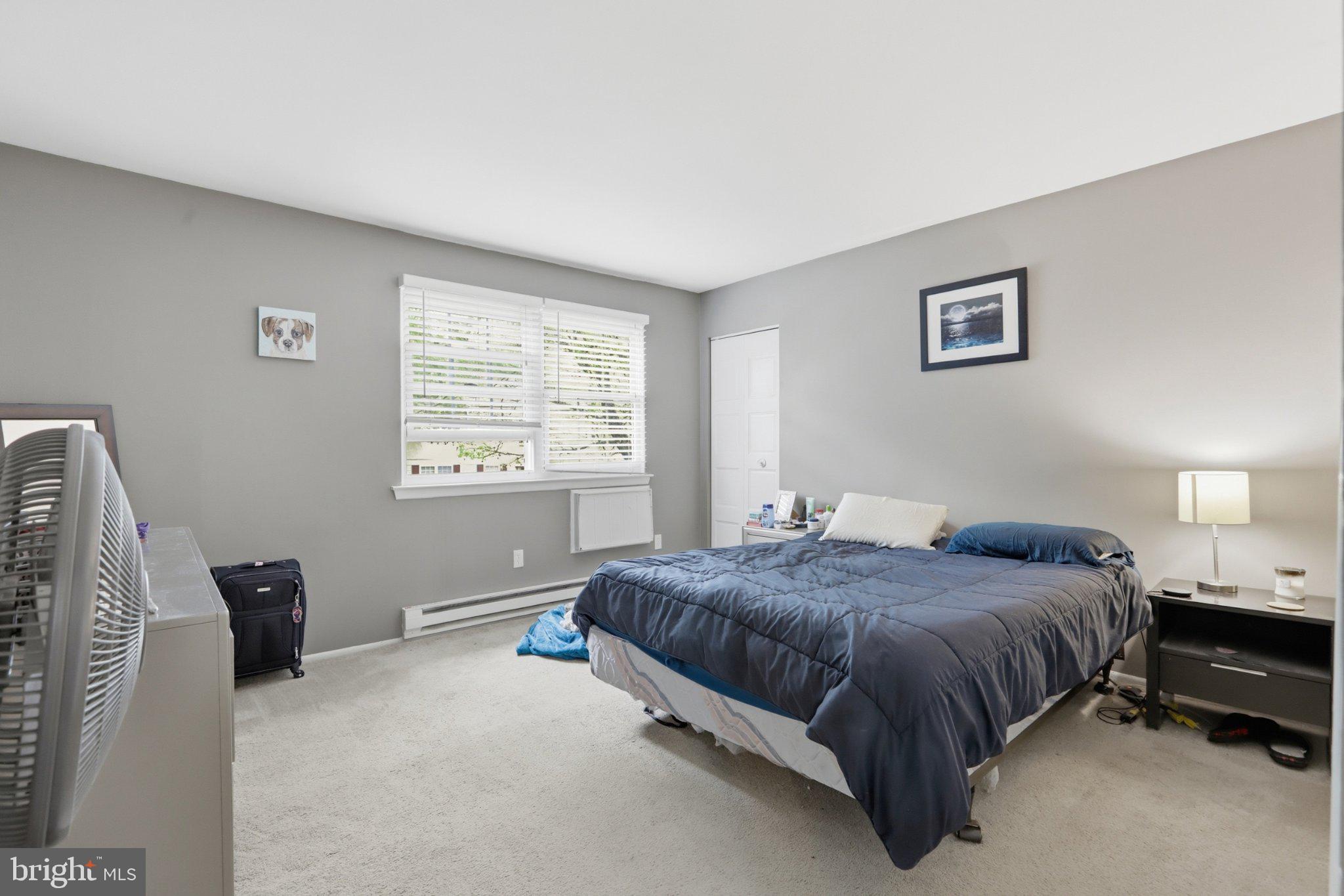 178 Elephant Road, Unit B22 Dublin, PA 18917 - Photo 8 of 17 Serene bedroom with natural light.