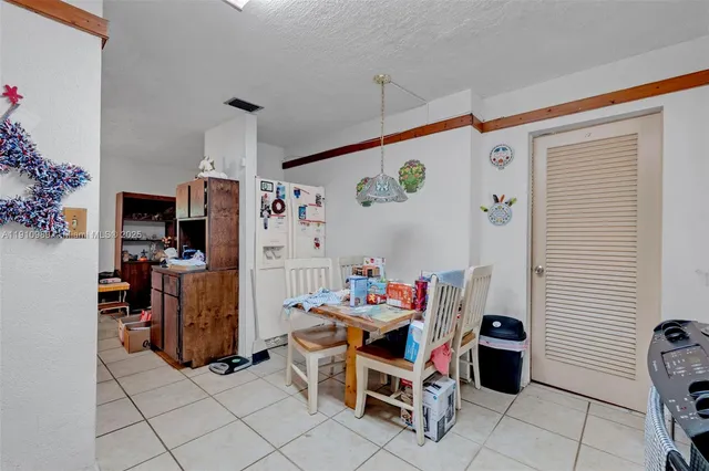 a storage room with furniture and a window