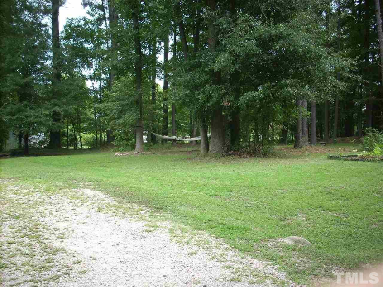 2715 Campbell Road, Unit B Raleigh, NC 27606 - Photo 16 of 25 a backyard of a house with barbeque oven