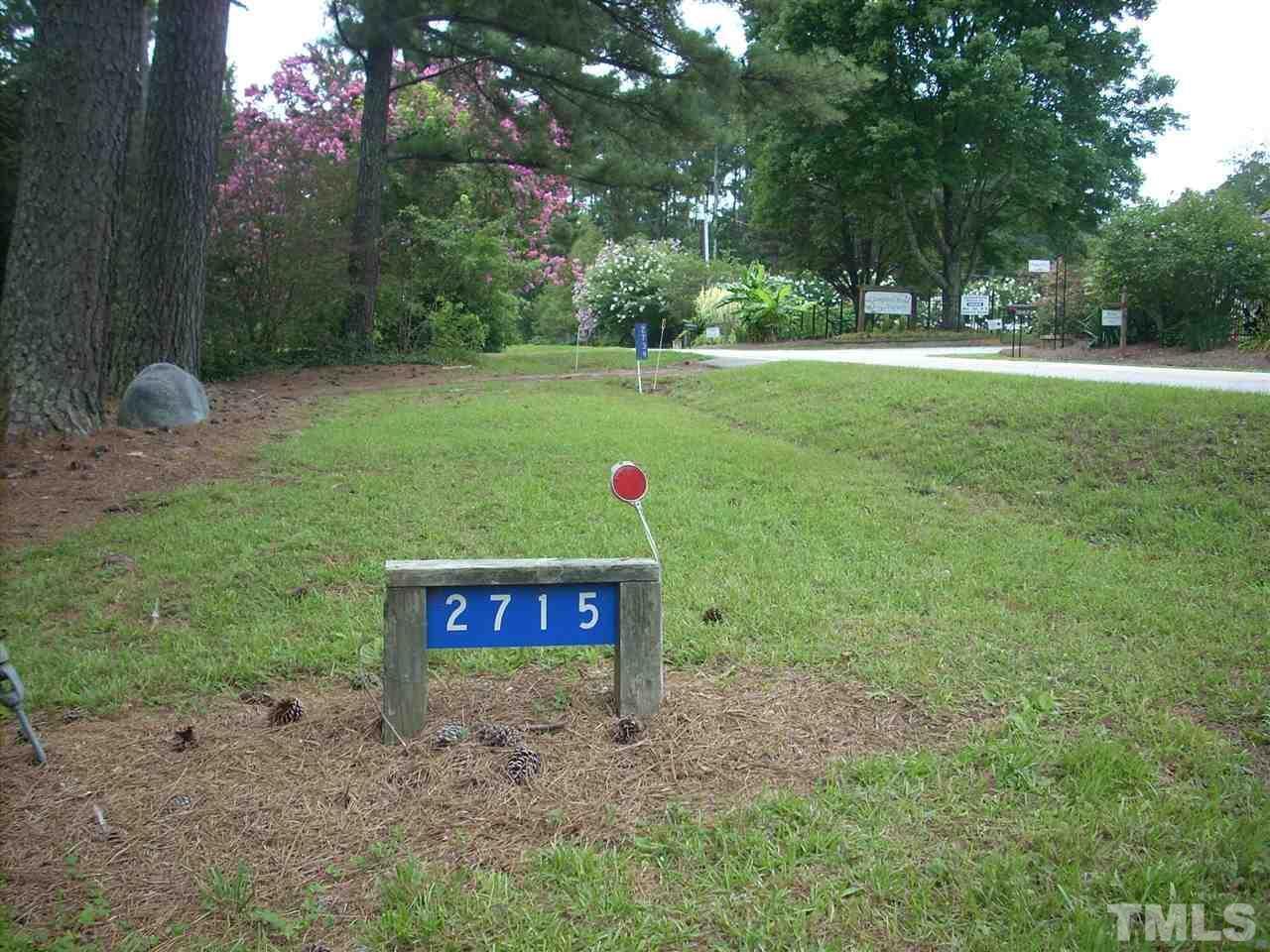 2715 Campbell Road, Unit B Raleigh, NC 27606 - Photo 2 of 25 a fire hydrant in the middle of a field