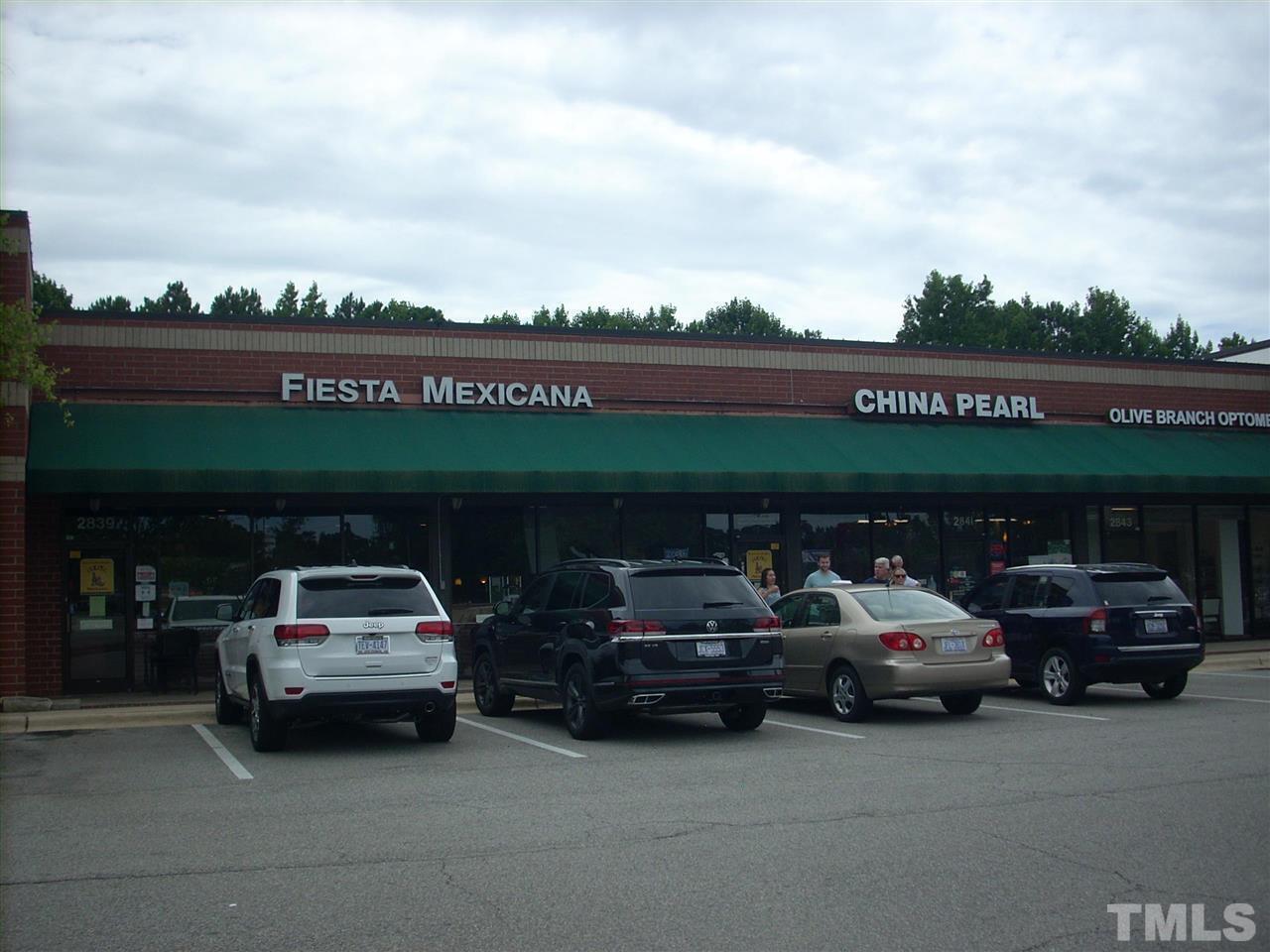 2715 Campbell Road, Unit B Raleigh, NC 27606 - Photo 22 of 25 a car parked in the parking lot