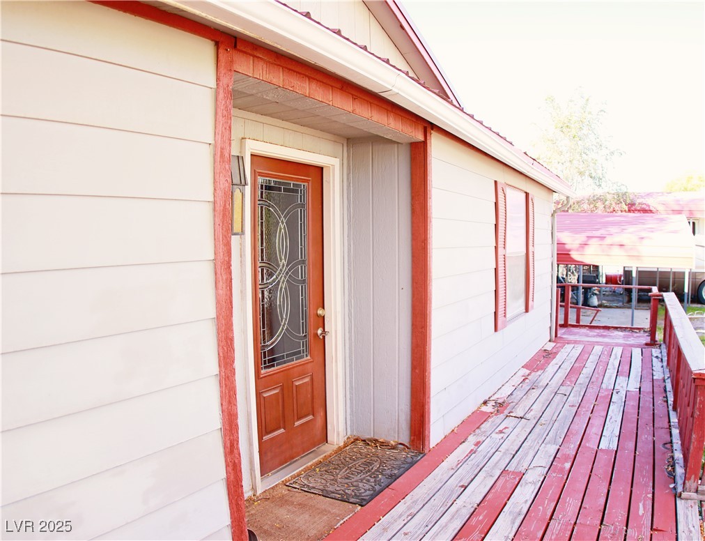 31 South 4th Street Panaca, NV 89042 - Photo 6 of 36 View of exterior entry featuring a deck