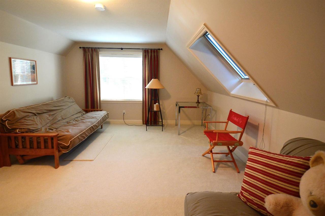 216 Riverview Lane Centerville, MA 02632 - Photo 16 of 16 a spacious bedroom with a bed and window