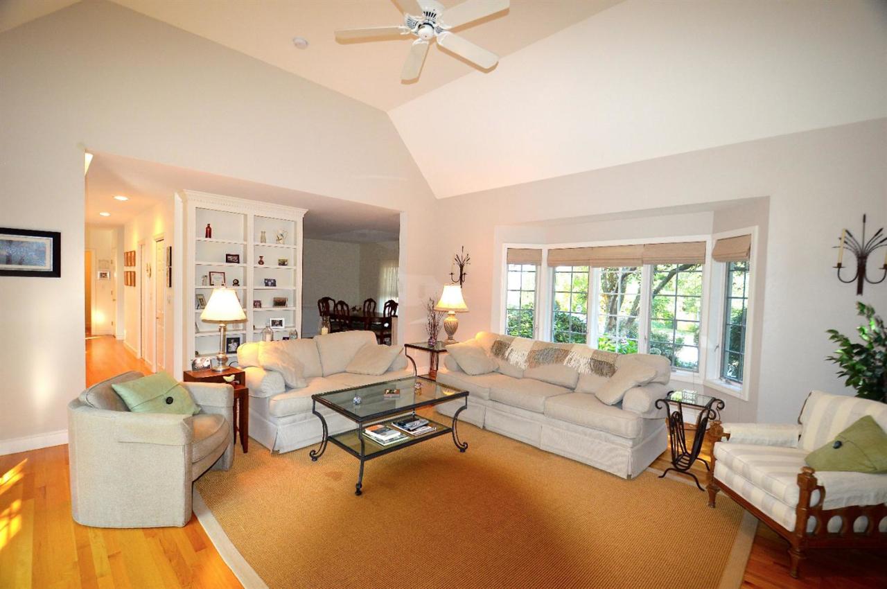 216 Riverview Lane Centerville, MA 02632 - Photo 6 of 16 a living room with furniture and a large window