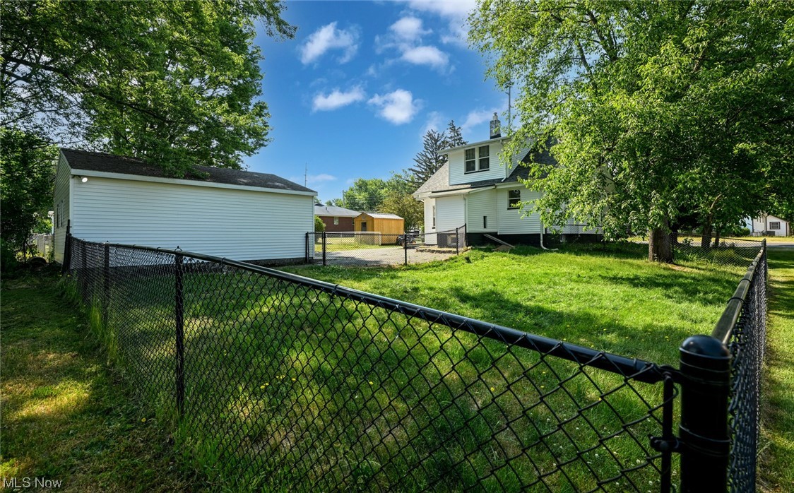 181 Swartz Road Akron, OH 44319 - Photo 2 of 23 This fence encloses only part of the backyard, and could be a pet enclosure or play space for kids, or whatever you might need.