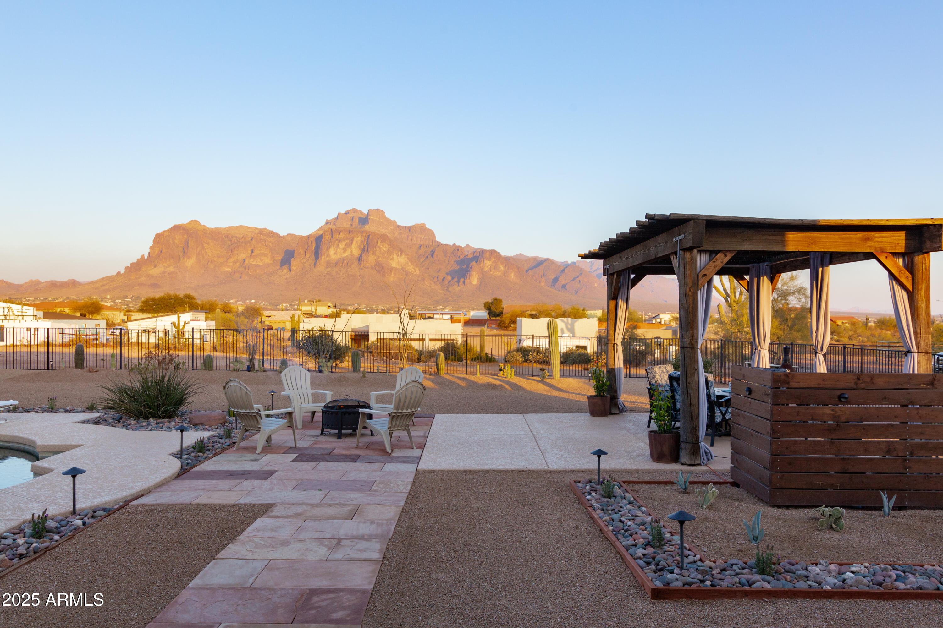 1775 North Starr Road Apache Junction, AZ 85119 - Photo 13 of 48 a view of a terrace with a bench