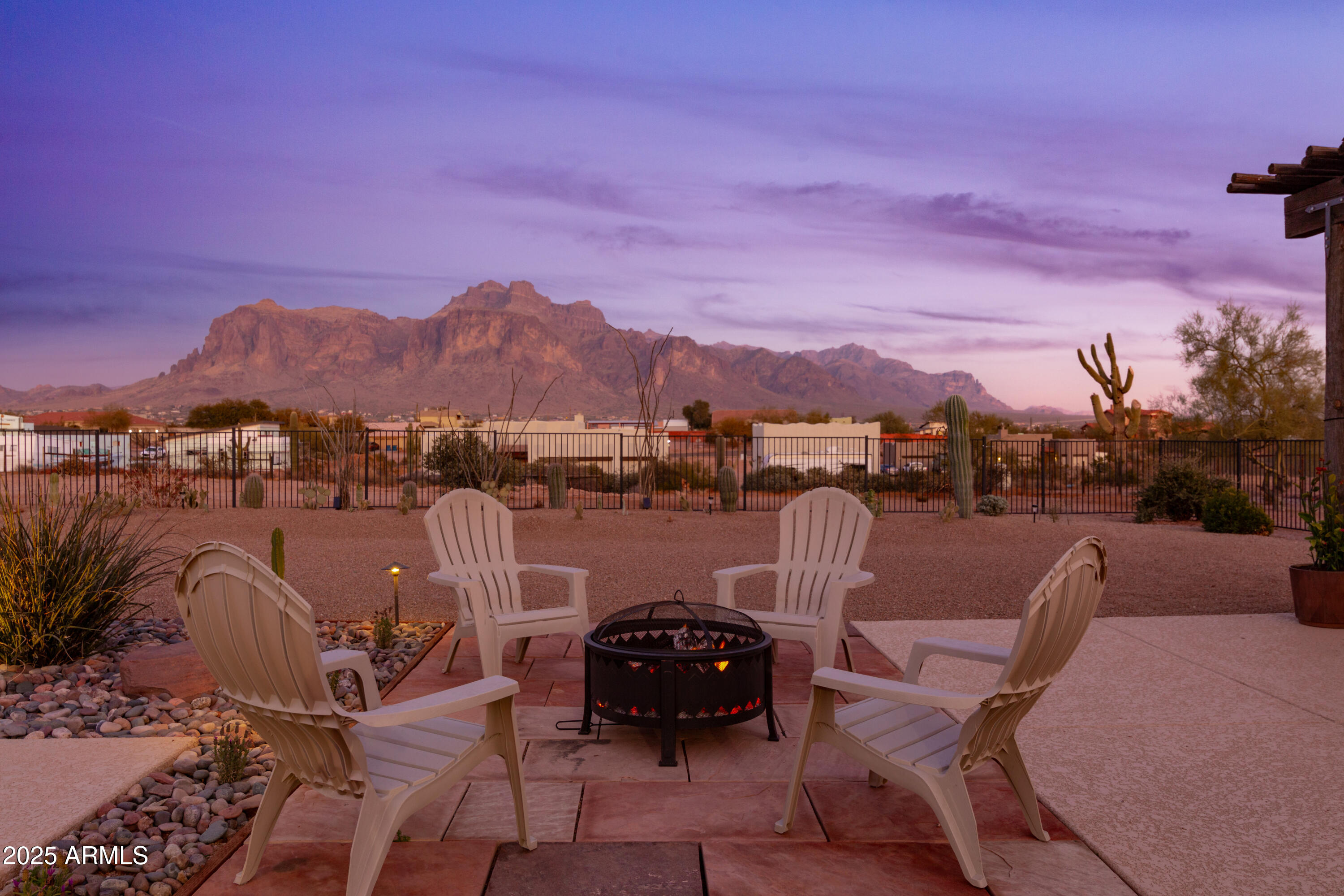 1775 North Starr Road Apache Junction, AZ 85119 - Photo 15 of 48 a roof deck with couch and city view