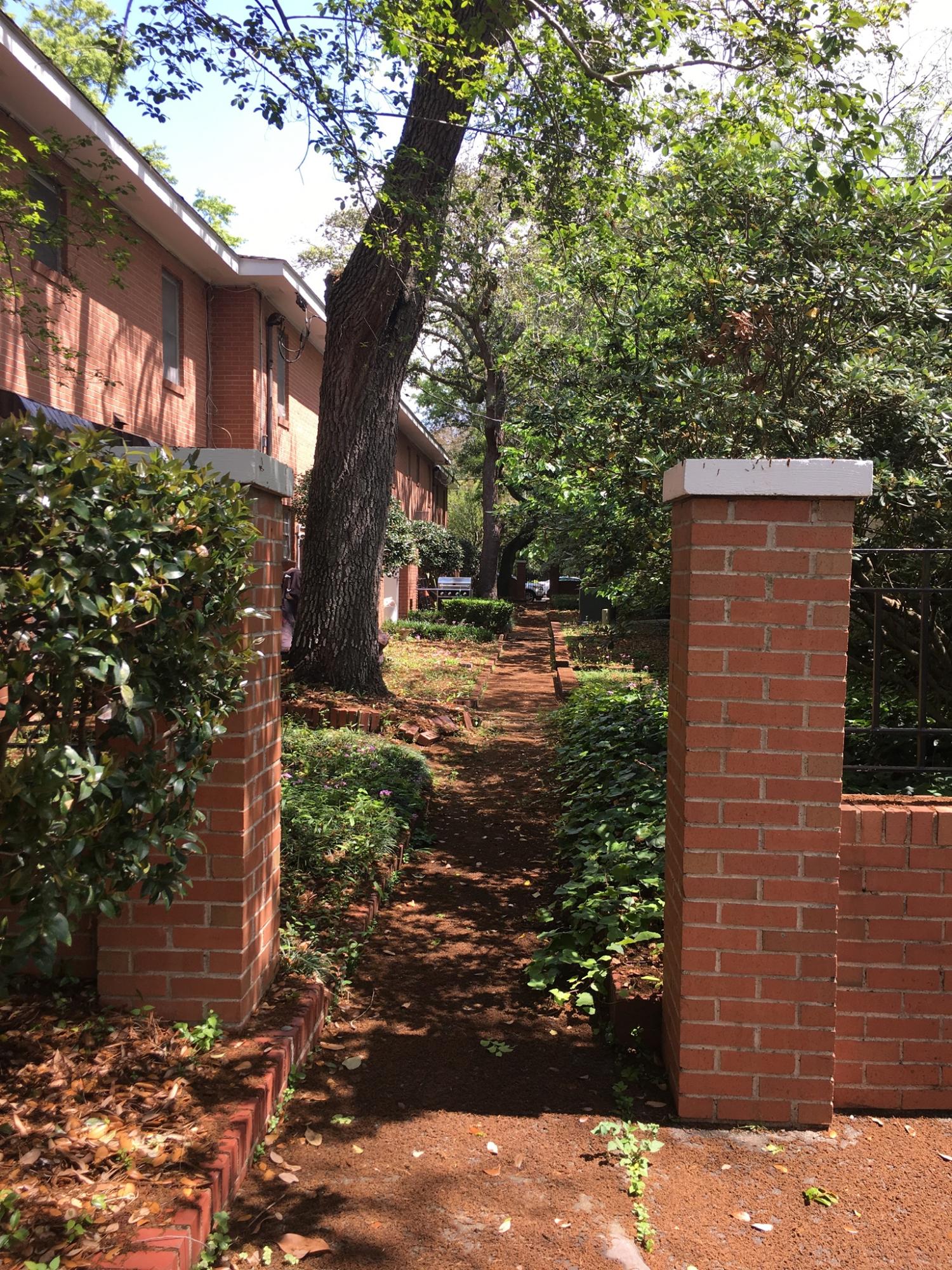 173 Rutledge Avenue, Unit F Charleston, SC 29403 - Photo 2 of 13 Back Alley Yard in back Alkey