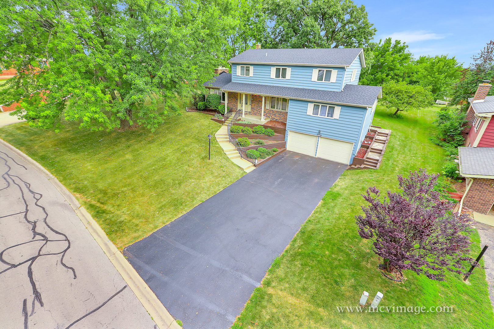 359 High Road Cary, IL 60013 - Photo 2 of 32 a view of a house with a yard