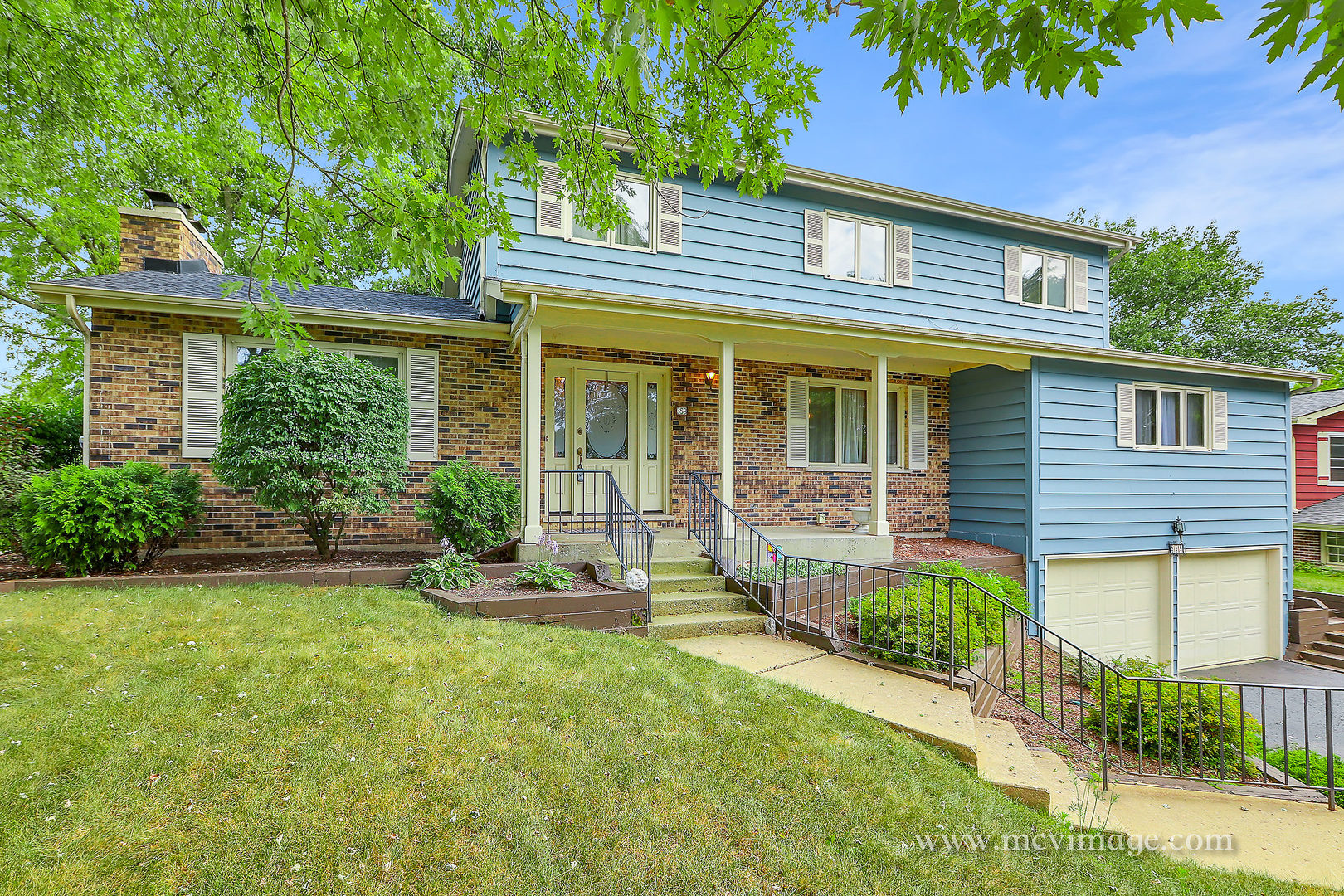 359 High Road Cary, IL 60013 - Photo 32 of 32 front view of a house with a yard