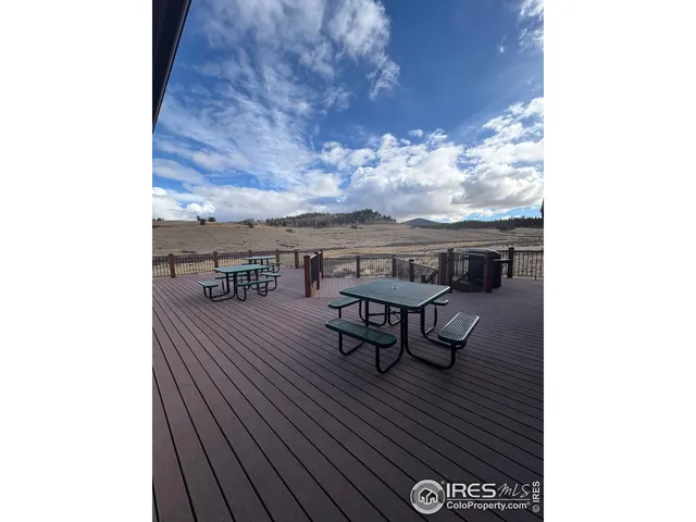 a view of an entryway with hardwood