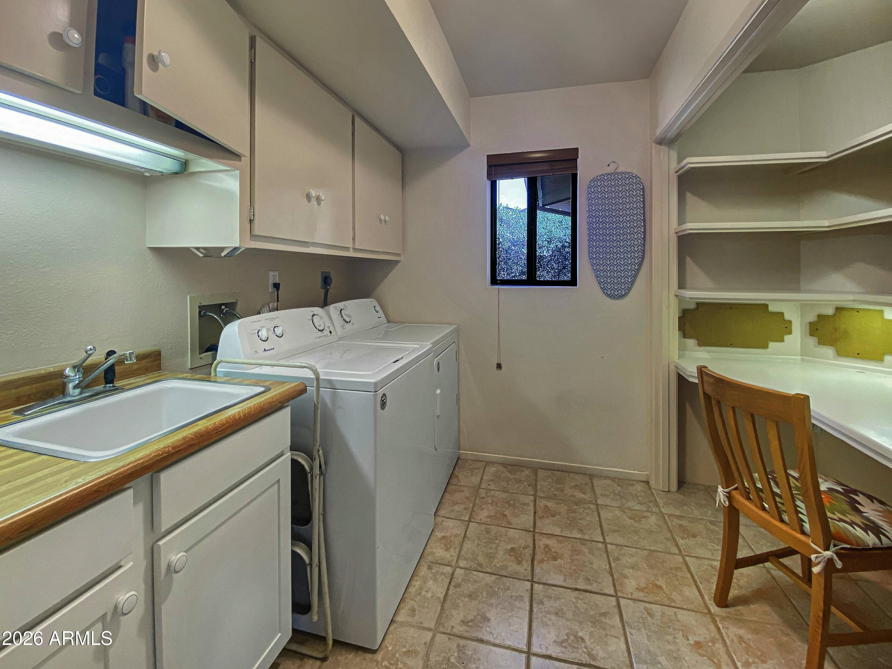 550 Barcelona Road Sedona, AZ 86336 - Photo 14 of 32 a utility room with dryer and washer