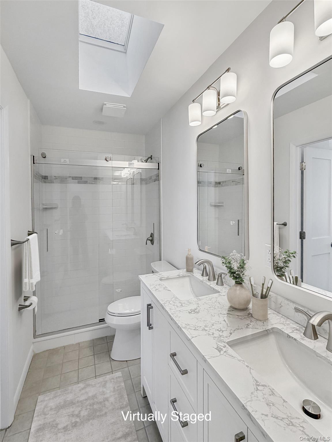 6 Andre Avenue Tappan, NY 10983 - Photo 8 of 23 Skylight overhead spotlights this totally renovated bathroom