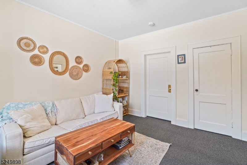 460 Bloomfield Avenue, Unit 3 Caldwell, NJ 07006 - Photo 2 of 8 a living room with patio and a couch