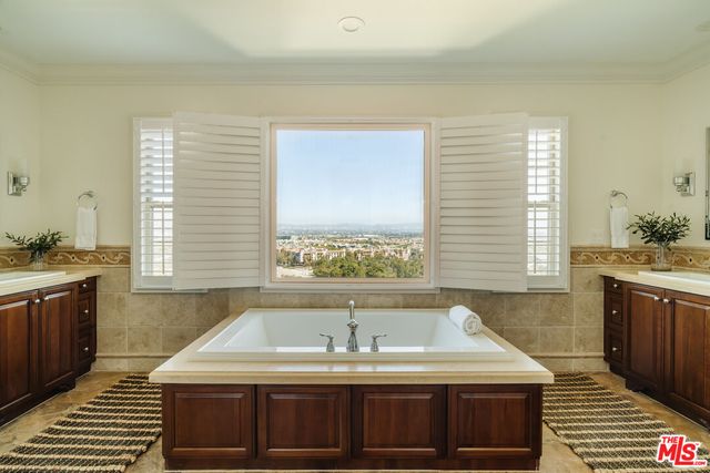 a room with a bed and a window