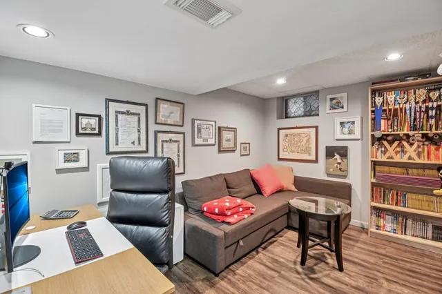 a view of entryway with wooden floor