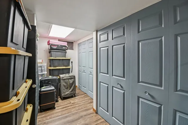 a view of a house with a snow in the yard