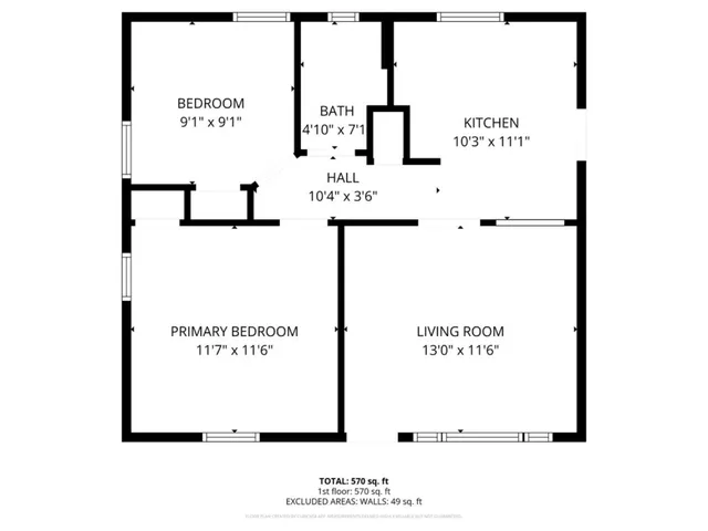 a view of the house with a yard