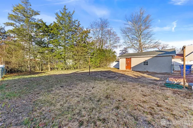 a view of a yard with lake view