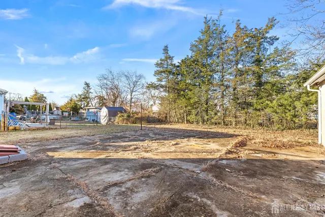 a house view with a garden space