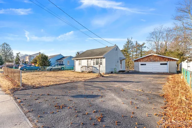 a view of large house with a yard