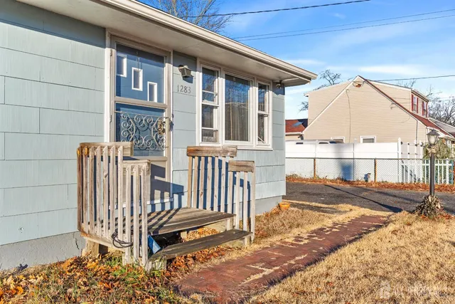 a view of a bench in the porch