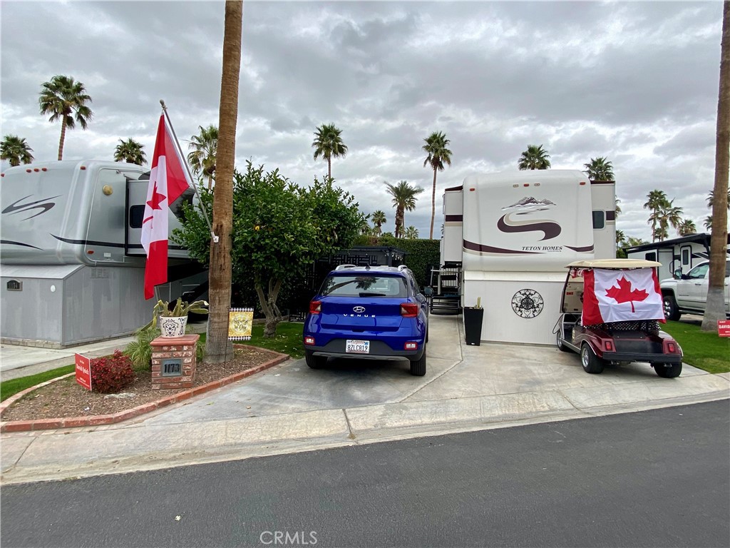 69411 Ramon Road Cathedral City, CA 92234 - Photo 12 of 14 a car parked in front of a store