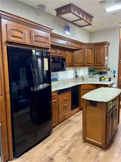 a kitchen with a stove and a microwave