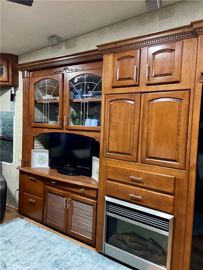 69411 Ramon Road Cathedral City, CA 92234 - Photo 4 of 14 a kitchen with a stove and a microwave