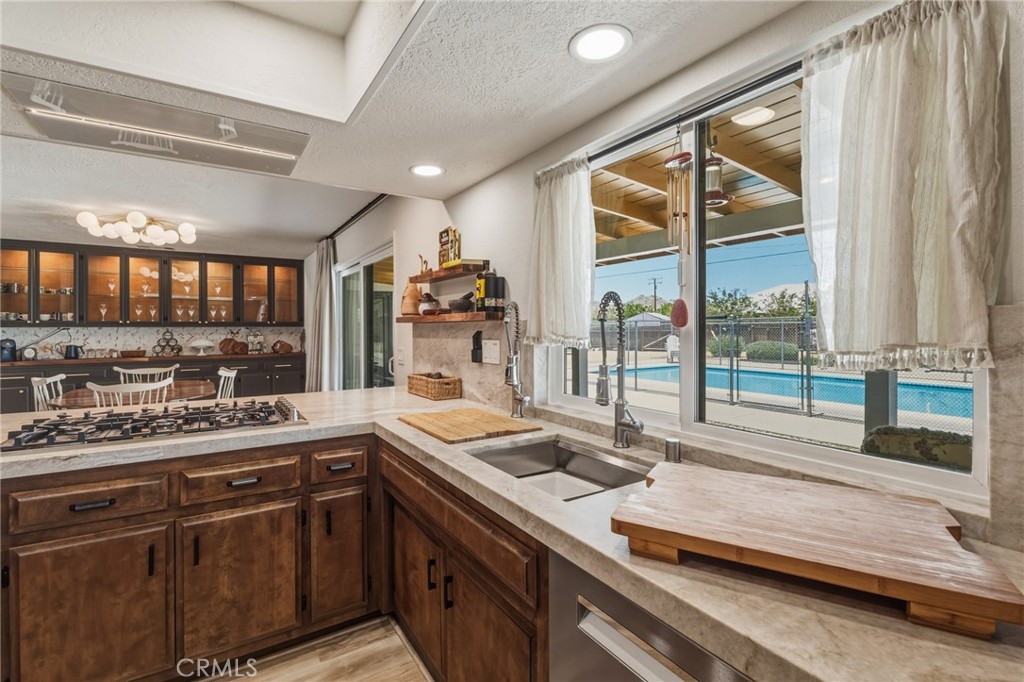 16230 St Timothy Road Apple Valley, CA 92307 - Photo 23 of 51 Kitchen dual sink with work station