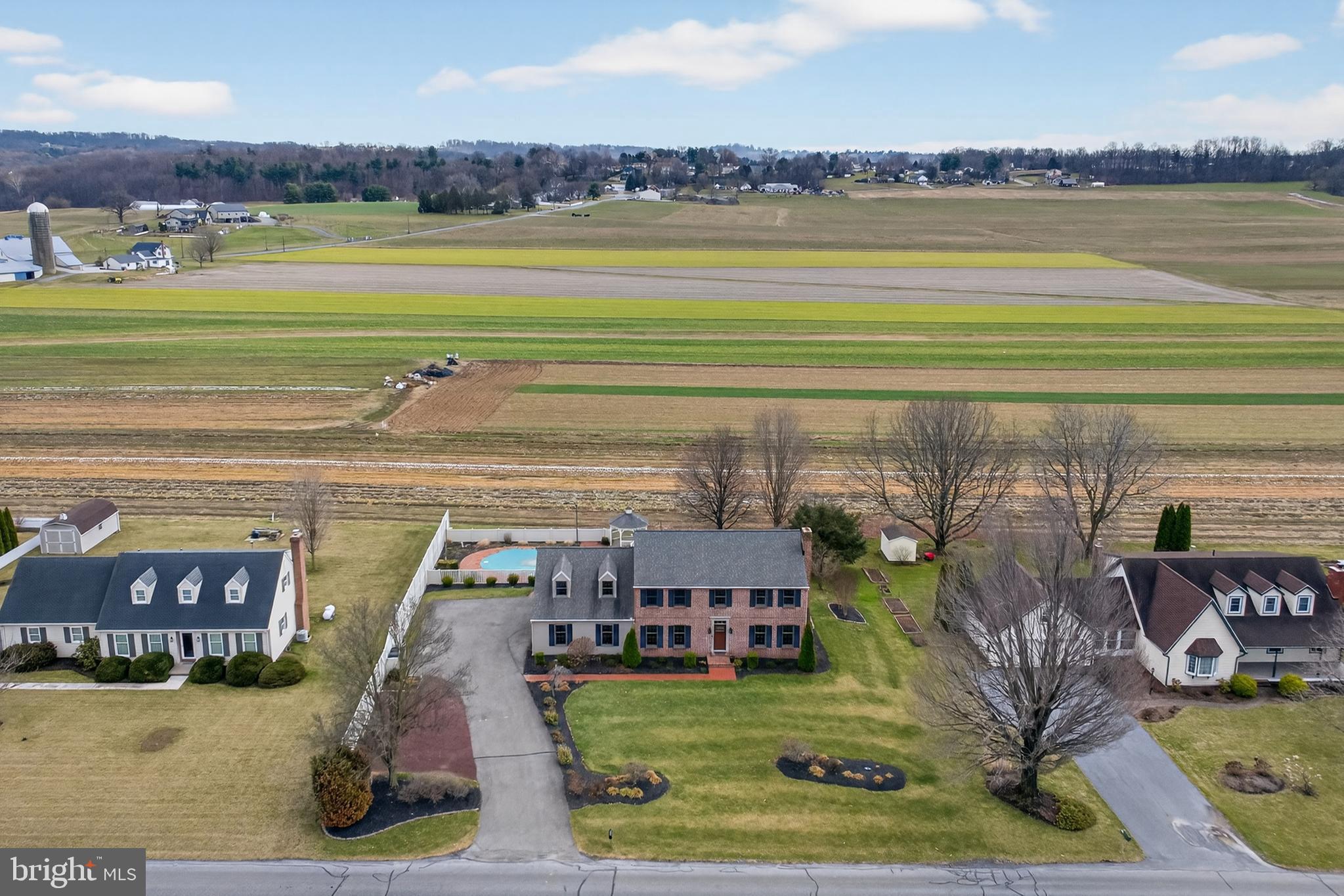 414 Twin Elm Road Strasburg, PA 17579 - Photo 2 of 30 a view of a city with lawn chairs