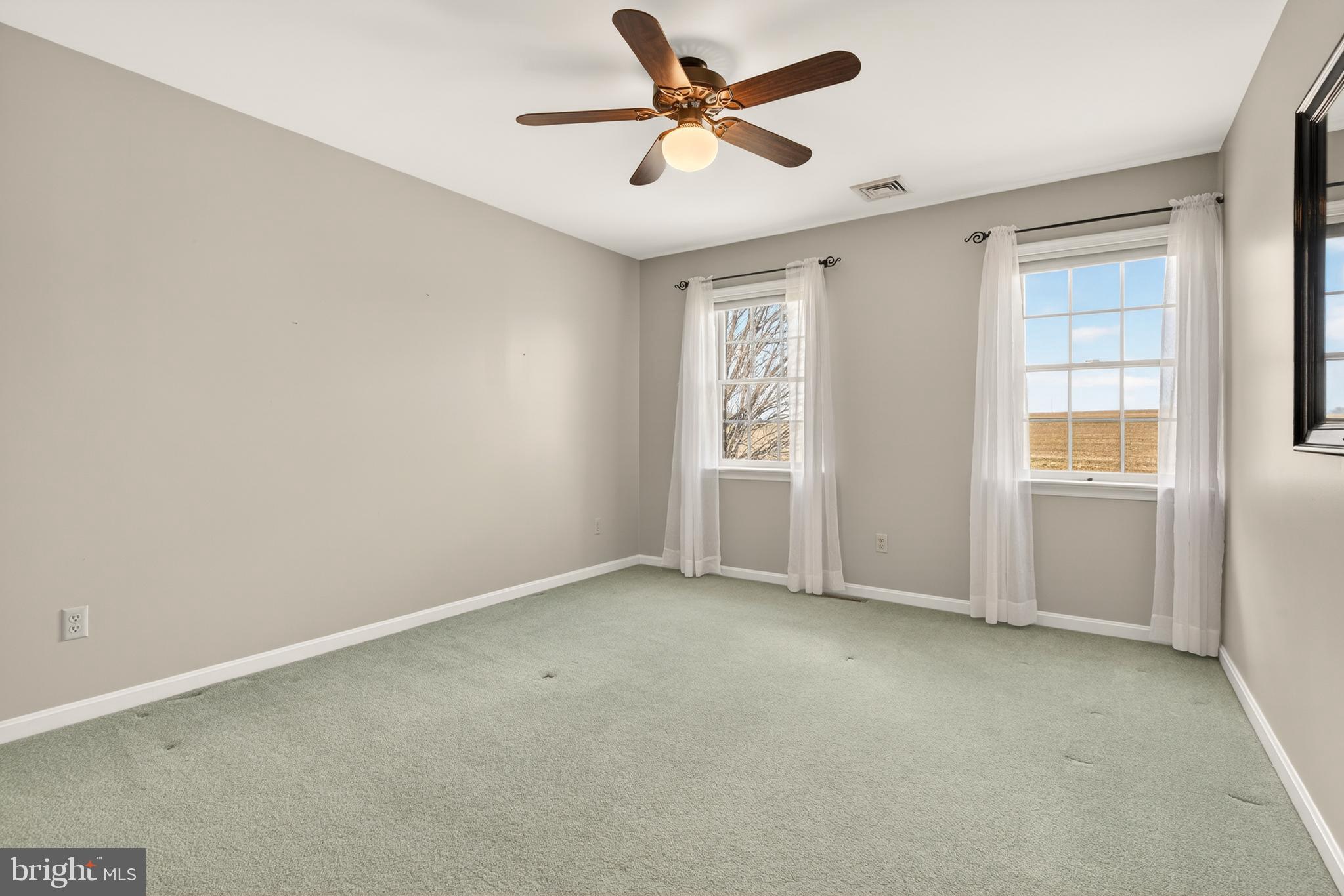 414 Twin Elm Road Strasburg, PA 17579 - Photo 22 of 30 an empty room with windows and fan
