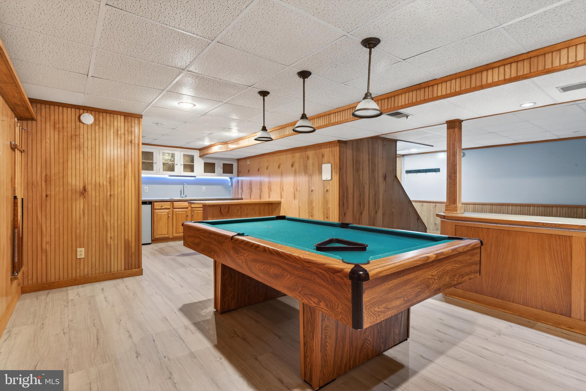 414 Twin Elm Road Strasburg, PA 17579 - Photo 24 of 30 a room with wooden floor and furniture