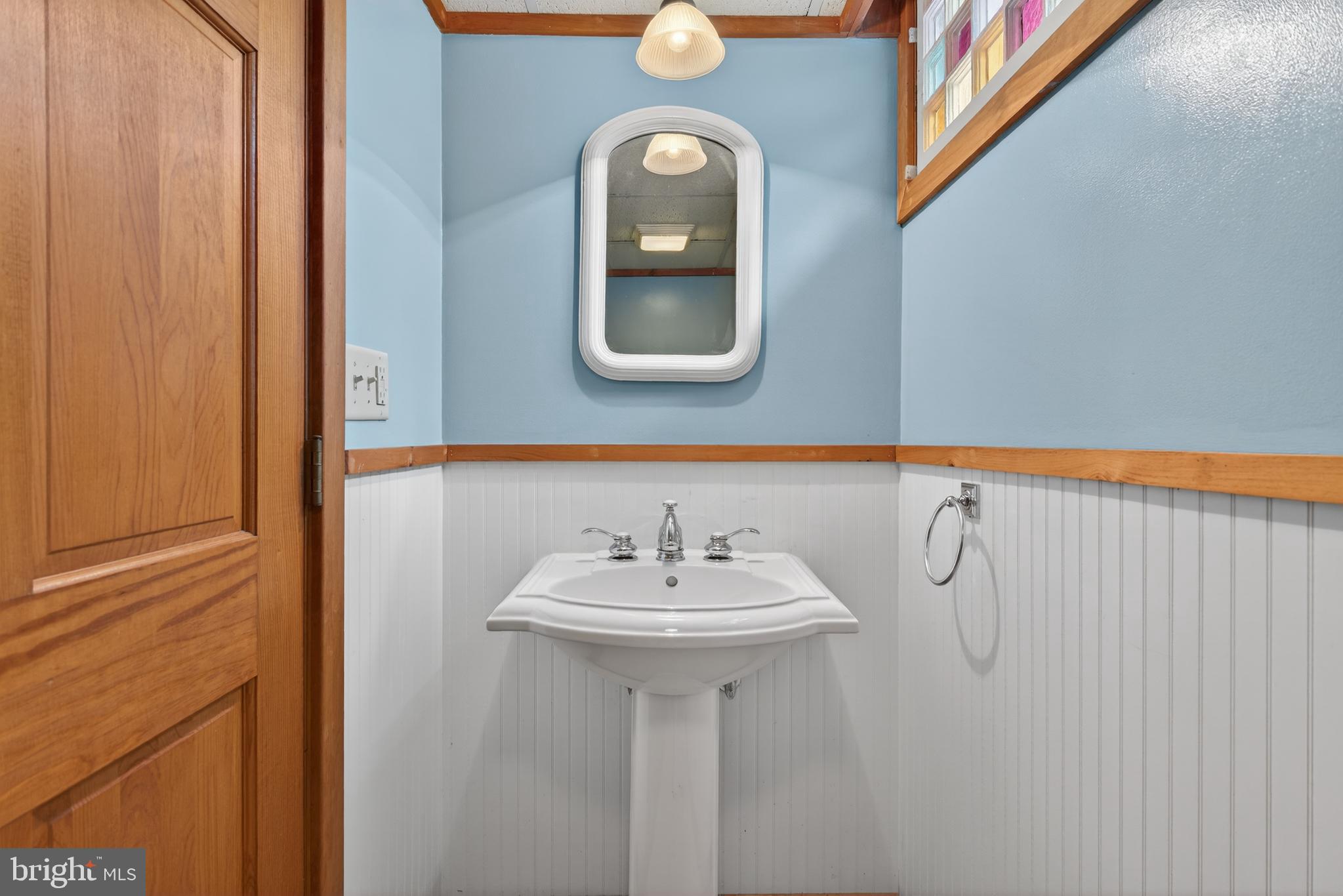 414 Twin Elm Road Strasburg, PA 17579 - Photo 27 of 30 a bathroom with a sink and a mirror
