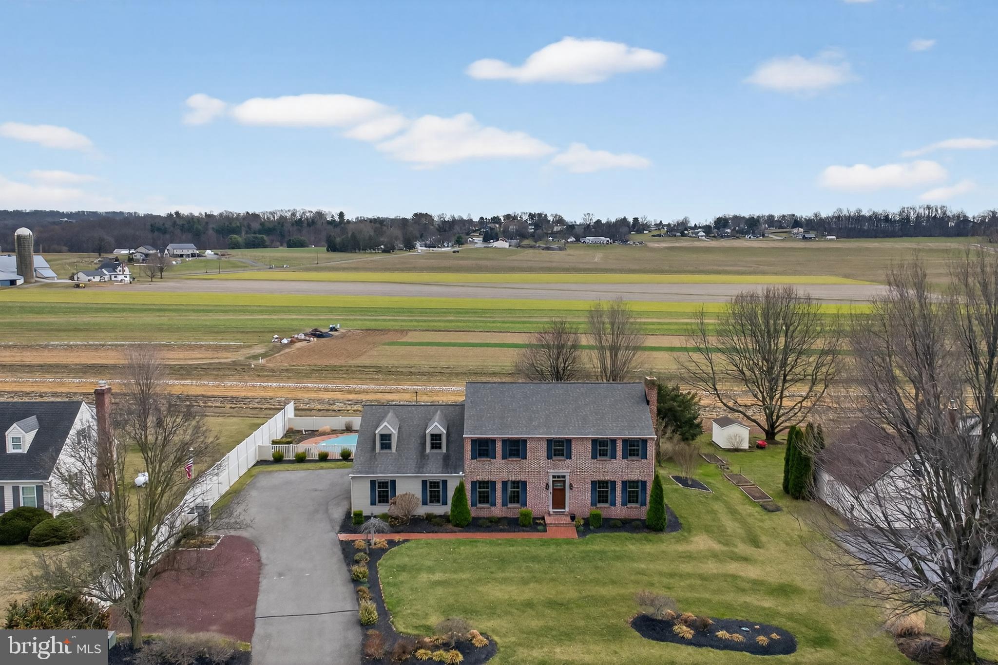 414 Twin Elm Road Strasburg, PA 17579 - Photo 28 of 30 a view of a lake with a big yard and large trees