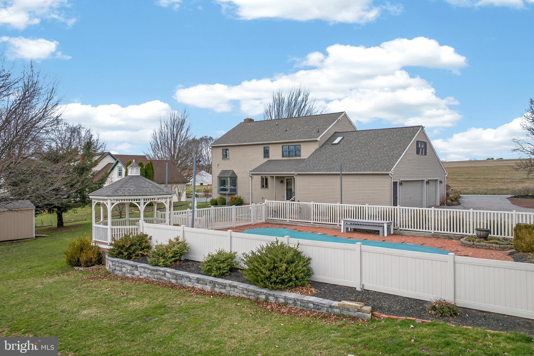 414 Twin Elm Road Strasburg, PA 17579 - Photo 30 of 30 a front view of house with yard and trees in the background