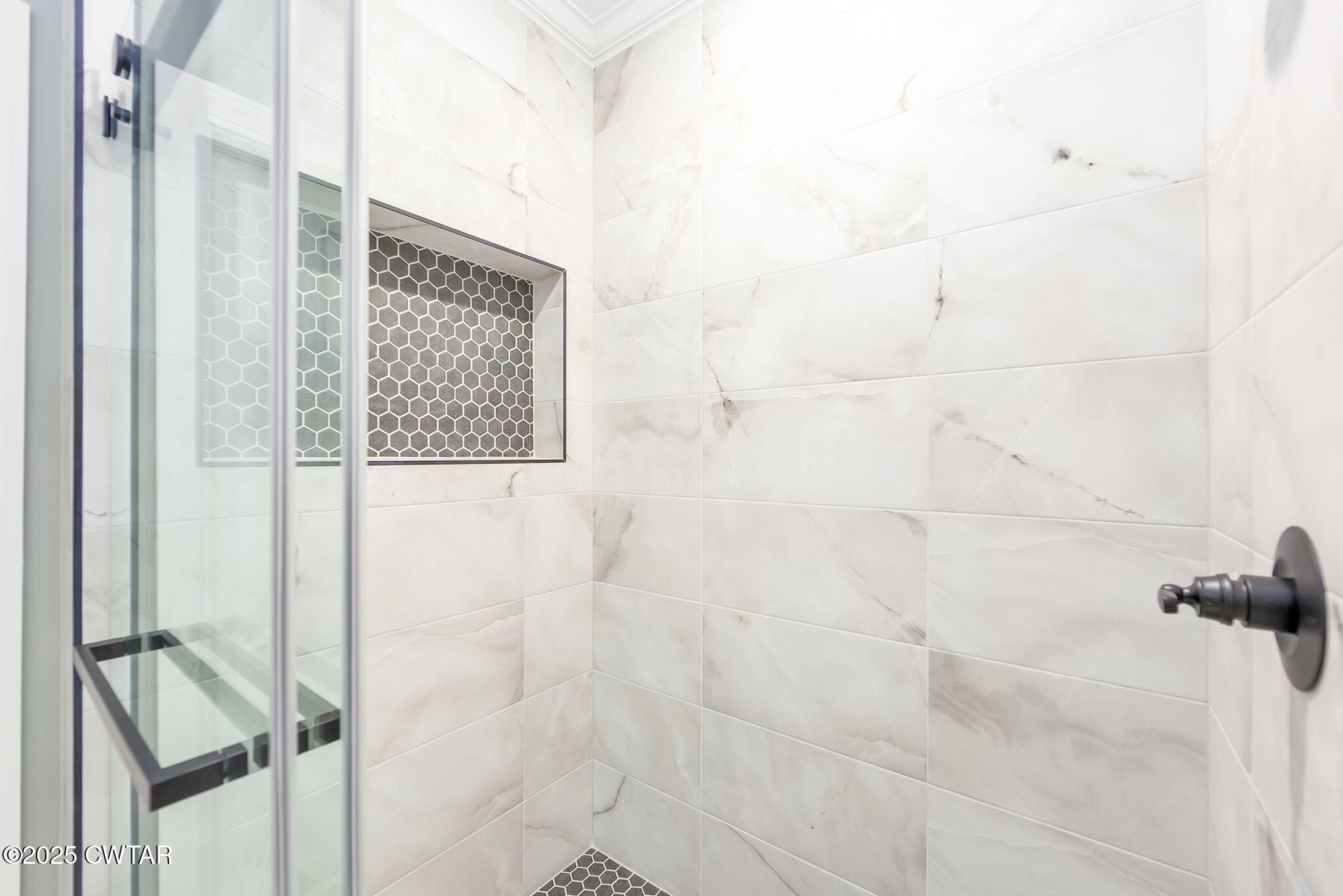 24 Enoch Cove Jackson, TN 38305 - Photo 19 of 30 a bathroom with a shower