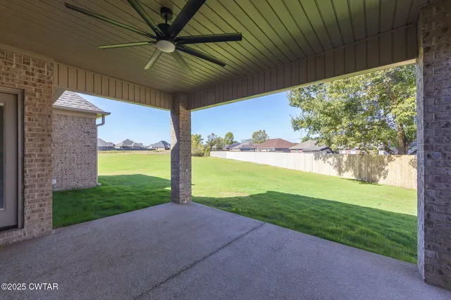 a house with swimming pool in front of it