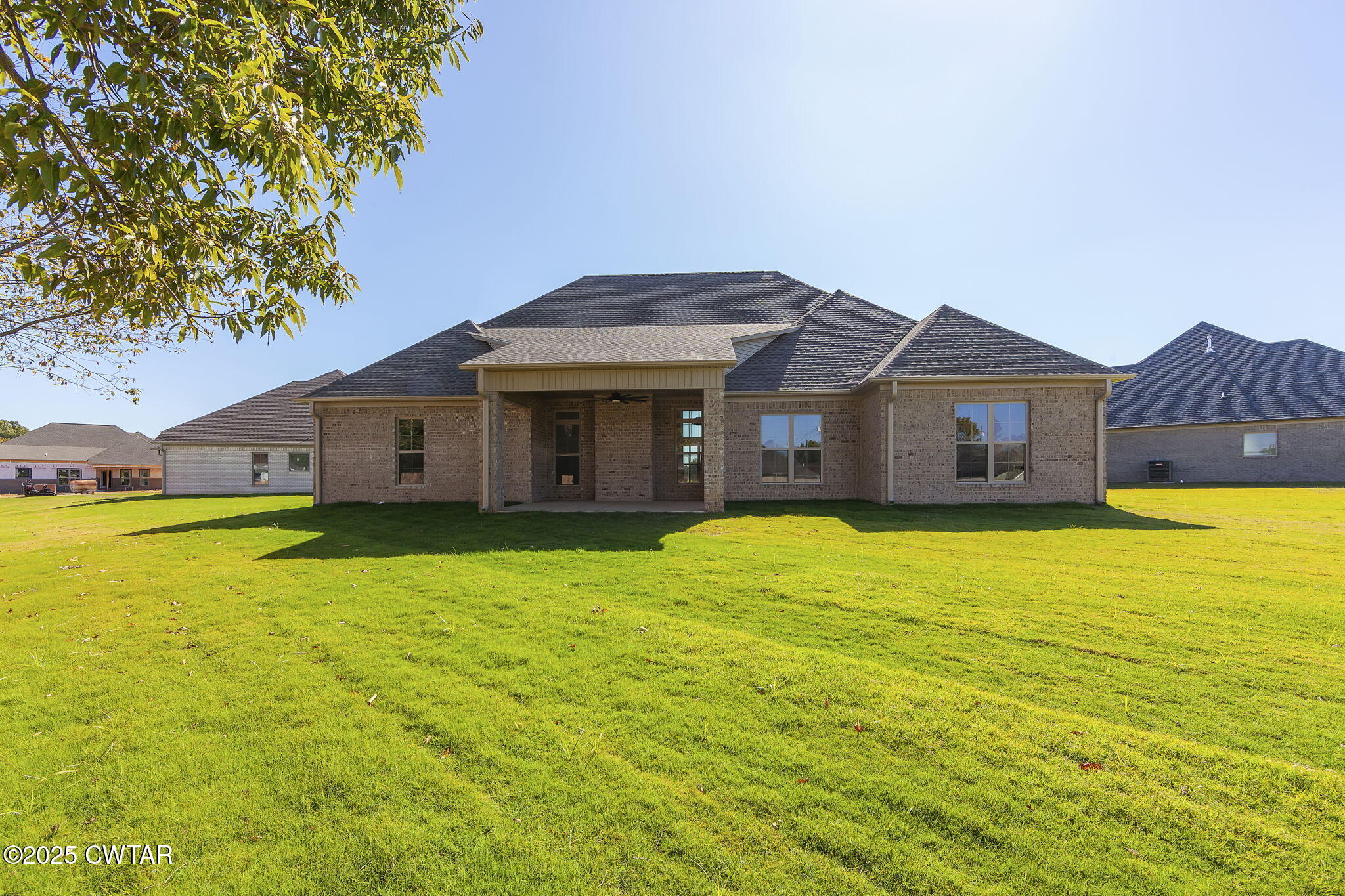 24 Enoch Cove Jackson, TN 38305 - Photo 29 of 30 a front view of a house with a yard