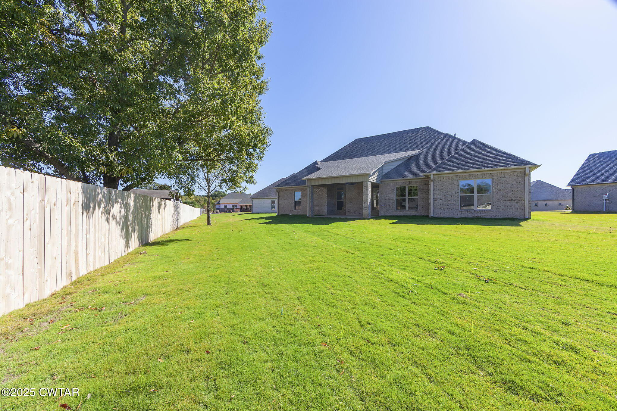 24 Enoch Cove Jackson, TN 38305 - Photo 30 of 30 a house with swimming pool in front of it