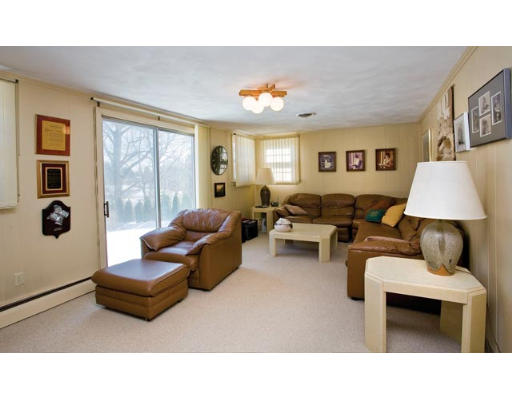 63 Lovett Road Newton, MA 02459 - Photo 3 of 5 a living room with furniture and a large window