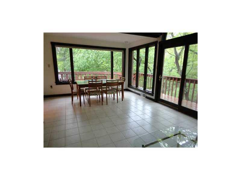 209 Highland Road Fox Chapel, PA 15238 - Photo 10 of 18 Sunroom. Enjoy dining in the generously spaced sunroom with a beautiful view of the outdoor surroundings.