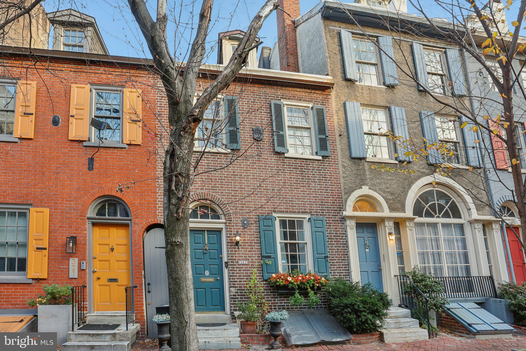 323 South Camac Street Philadelphia, PA 19107 - Photo 1 of 37 a view of multiple houses with a pathway