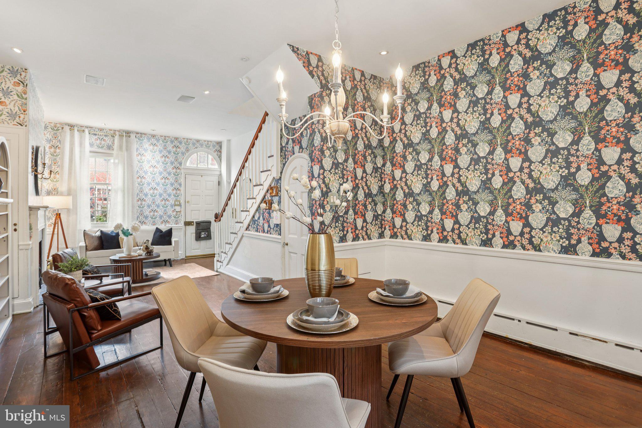 323 South Camac Street Philadelphia, PA 19107 - Photo 11 of 37 a view of a dining room with furniture and wooden floor