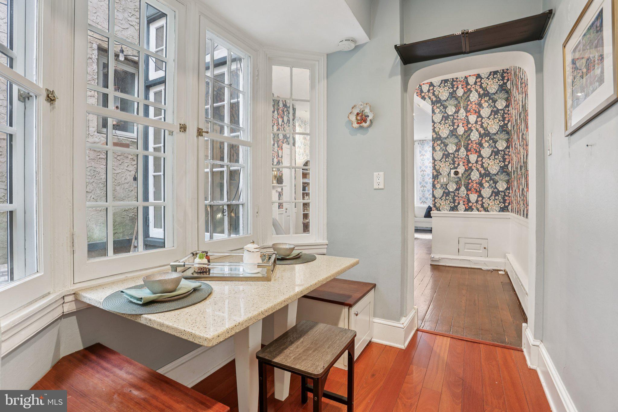 323 South Camac Street Philadelphia, PA 19107 - Photo 13 of 37 a view of a dining room with furniture window and wooden floor
