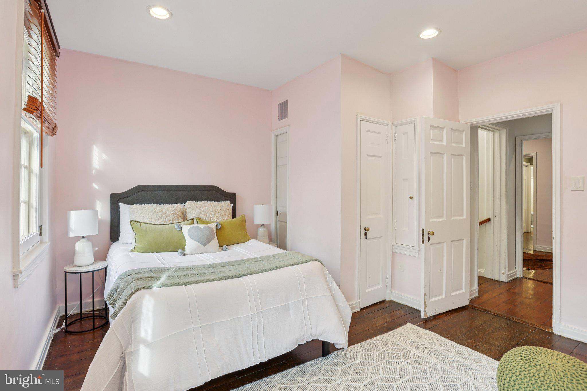 323 South Camac Street Philadelphia, PA 19107 - Photo 18 of 37 a bedroom with a bed and a couch